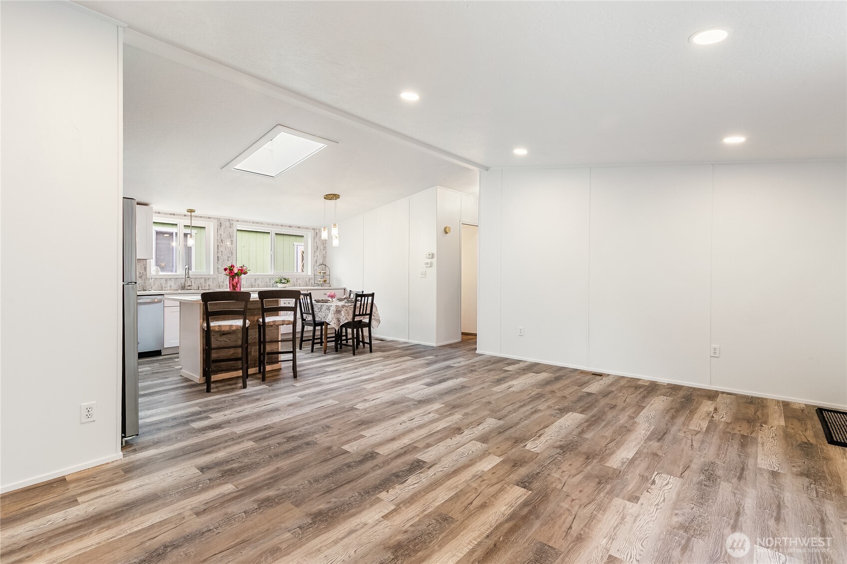 2350 Douglas Road, Unit 39 Ferndale, WA 98248 - Photo 15 of 35 a view of a room with furniture and a wooden floor