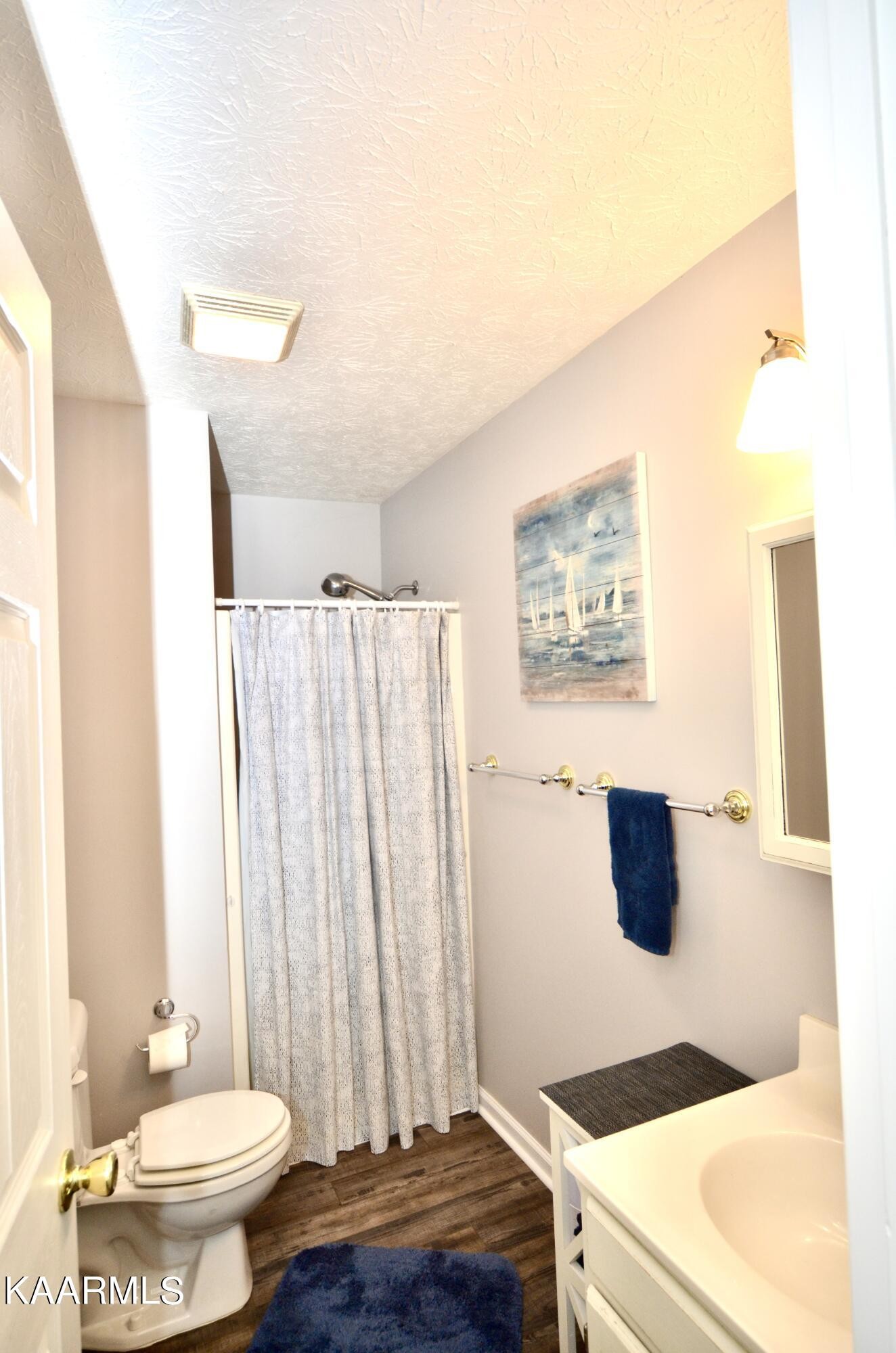 415 Sam Heim Road Rutledge, TN 37861 - Photo 15 of 41 a bathroom with a sink and a mirror