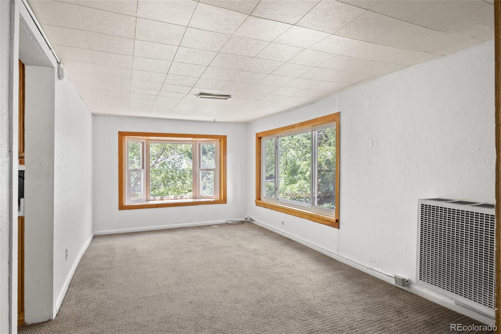 315 Spring Street Morrison, CO 80465 - Photo 11 of 40 an empty room with windows