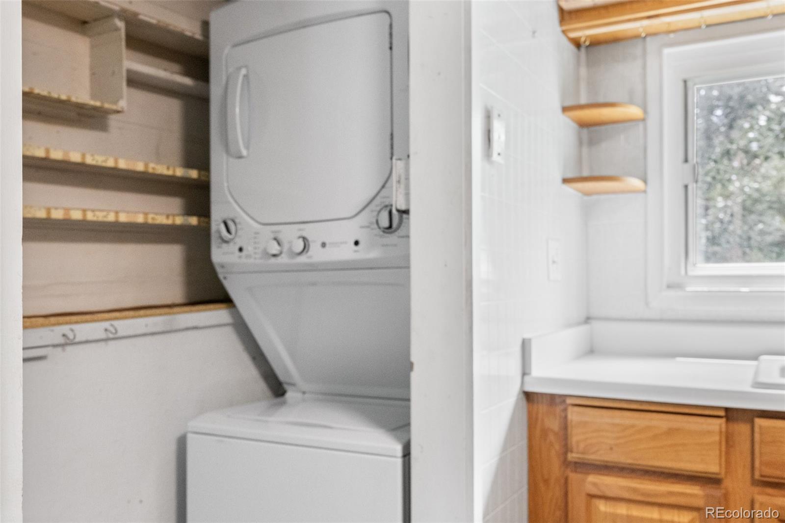 315 Spring Street Morrison, CO 80465 - Photo 18 of 40 a utility room with dryer and washer