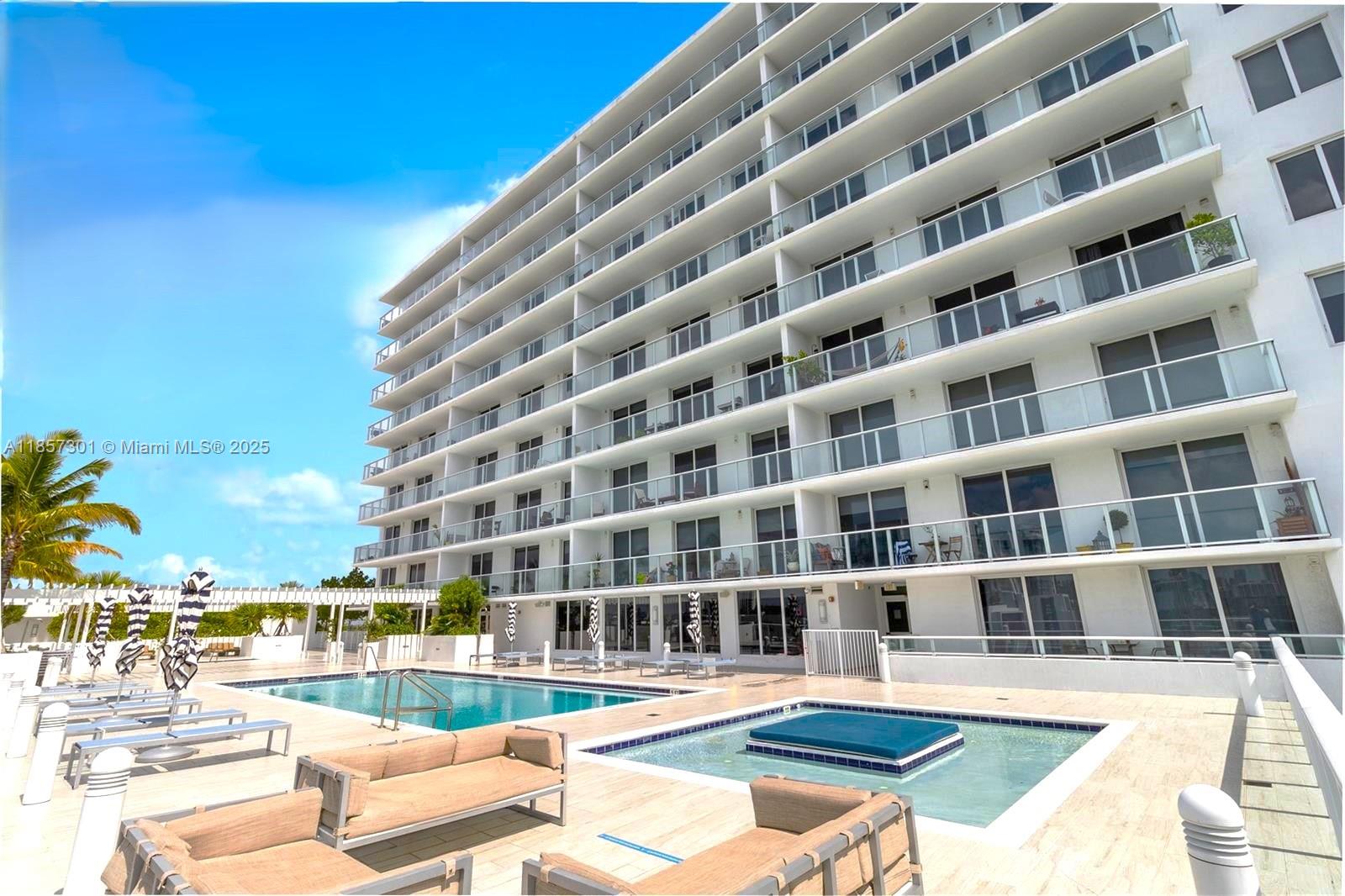 4250 Biscayne Boulevard, Unit 1008 Miami, FL 33137 - Photo 2 of 42 a view of a tall building from a patio