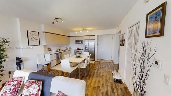 a living room with furniture and a table