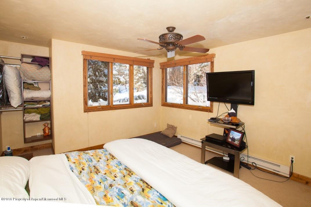 154 Meadow Ranch Road, Unit F1D Snowmass Village, CO 81615 - Photo 9 of 20 Master bedroom