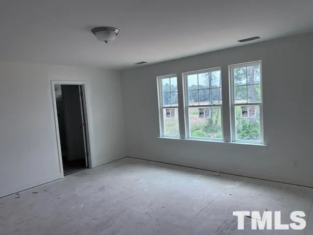 an empty room with a window