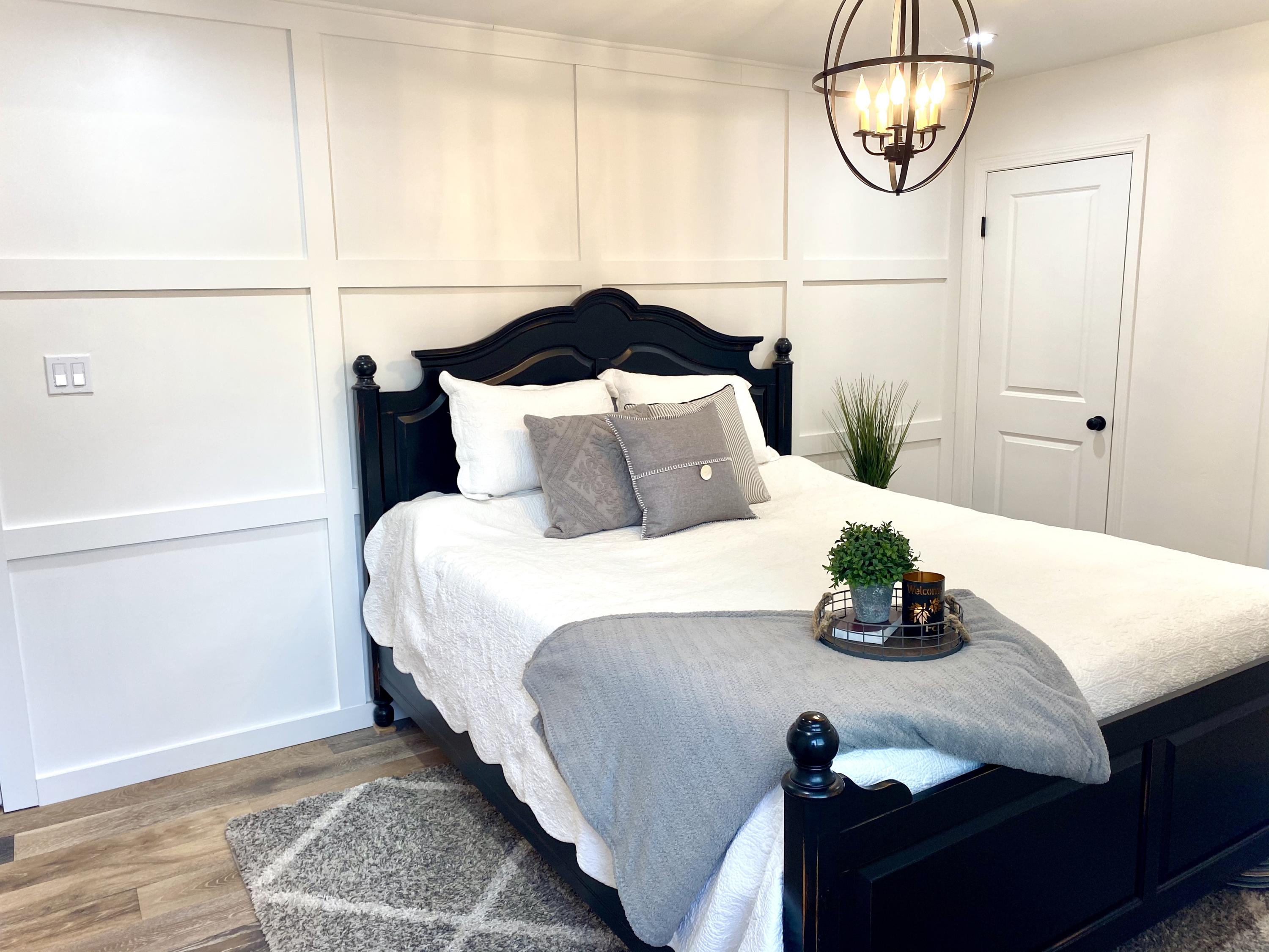 3048 Paseo Tranquillo Santa Barbara, CA 93105 - Photo 10 of 19 a bedroom with a bed and wooden floor