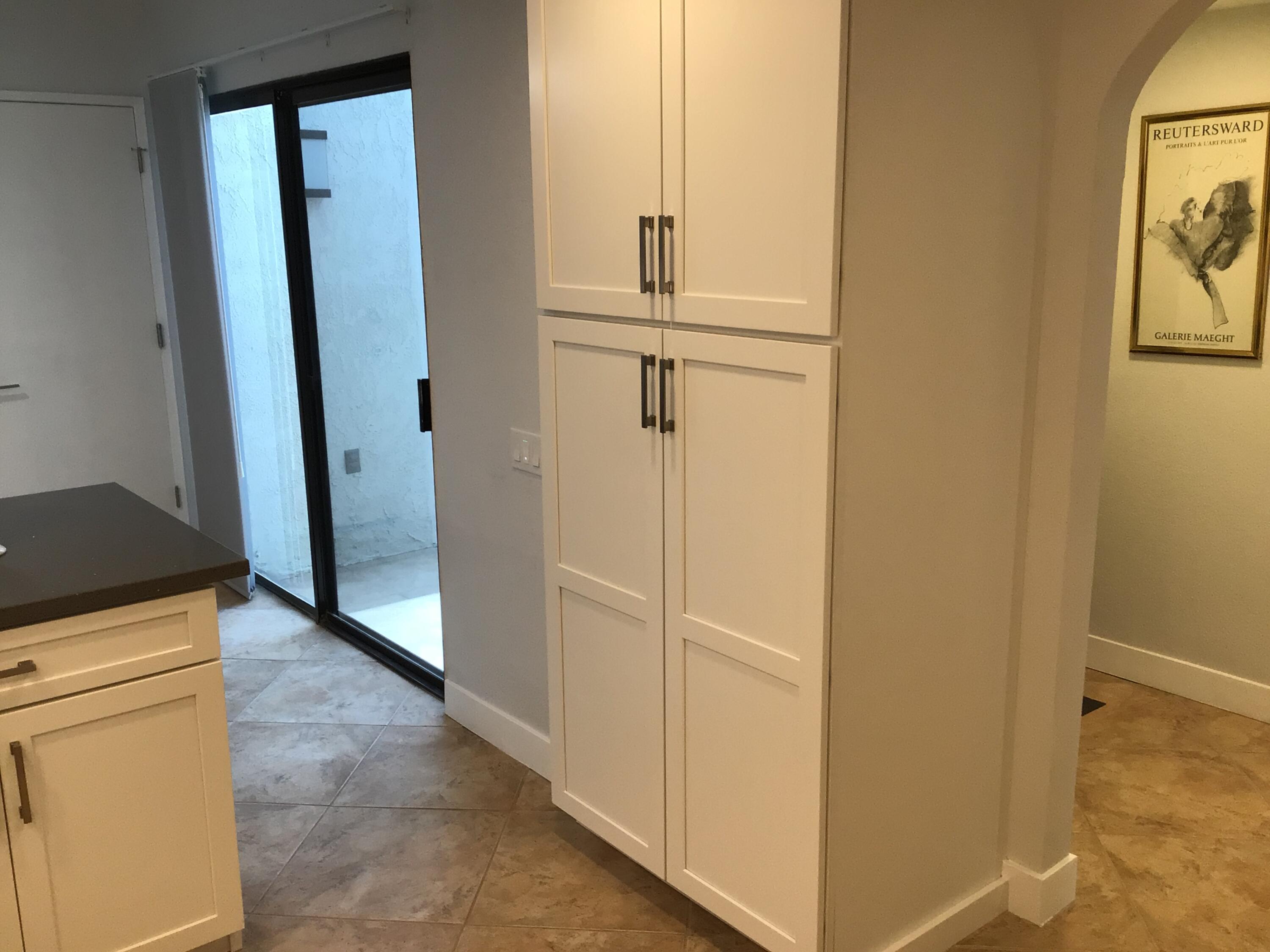 618 Violeta Drive Palm Springs, CA 92262 - Photo 18 of 35 a view of a kitchen from the hallway