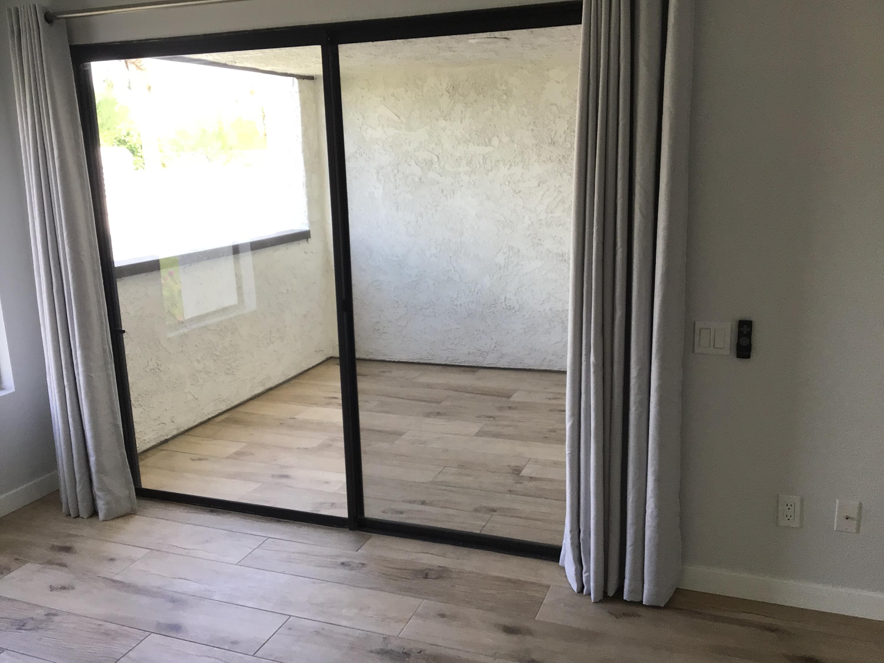 618 Violeta Drive Palm Springs, CA 92262 - Photo 27 of 35 an empty room with sliding door