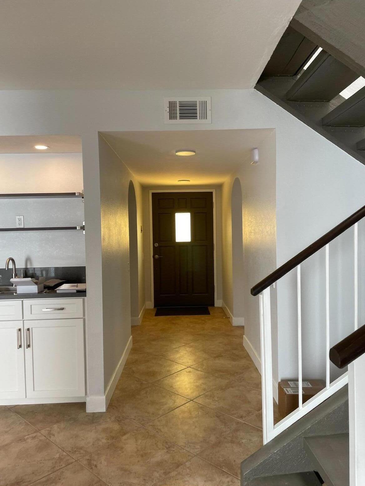 618 Violeta Drive Palm Springs, CA 92262 - Photo 9 of 35 a view of a kitchen with a sink and cabinets