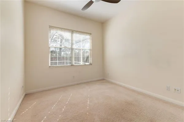 a bathroom with a shower and a toilet