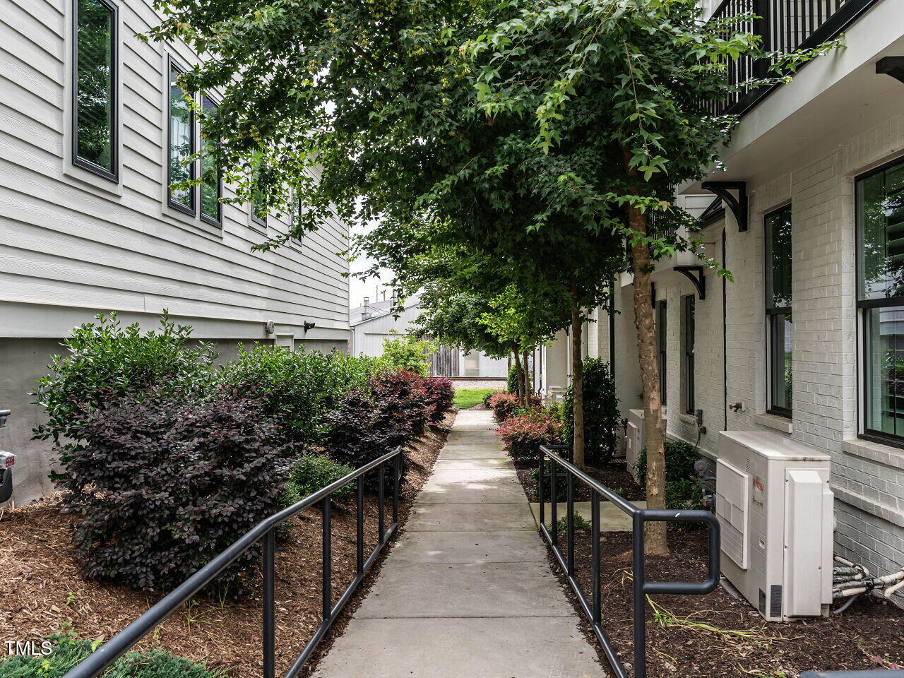 1610 Draper View Loop, Unit 101 Raleigh, NC 27608 - Photo 7 of 38 033-1280x960-walkway