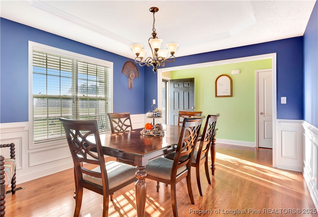 7453 7th Street Road Lumberton, NC 28358 - Photo 19 of 37 a view of a dining room with furniture window and outside view