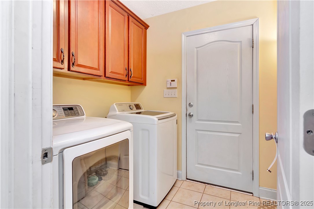 7453 7th Street Road Lumberton, NC 28358 - Photo 29 of 37 a utility room with dryer and washer