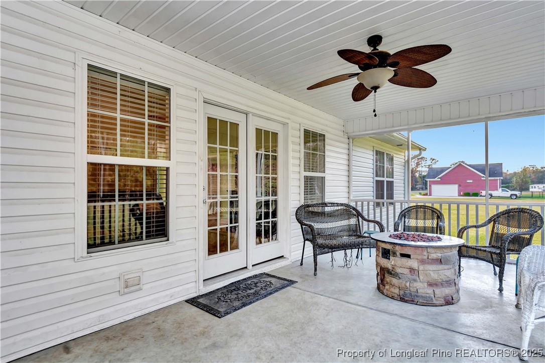 7453 7th Street Road Lumberton, NC 28358 - Photo 30 of 37 a work room with furniture and windows