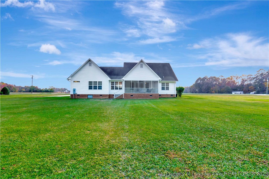 7453 7th Street Road Lumberton, NC 28358 - Photo 33 of 37 a view of house with garden