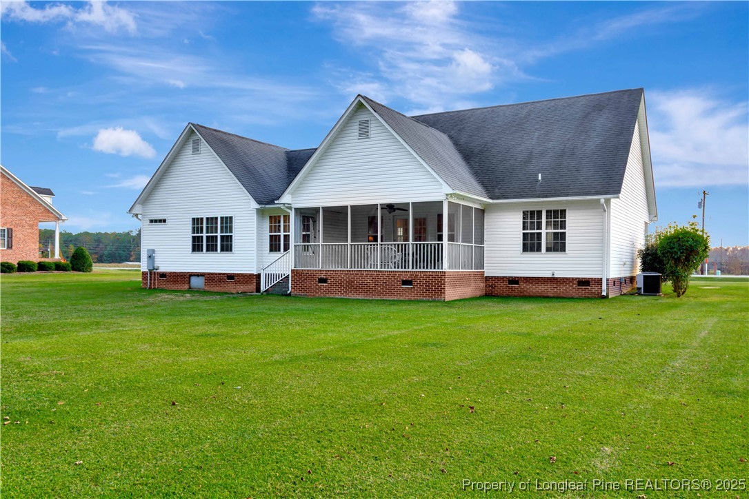 7453 7th Street Road Lumberton, NC 28358 - Photo 35 of 37 a view of a house with backyard and garden