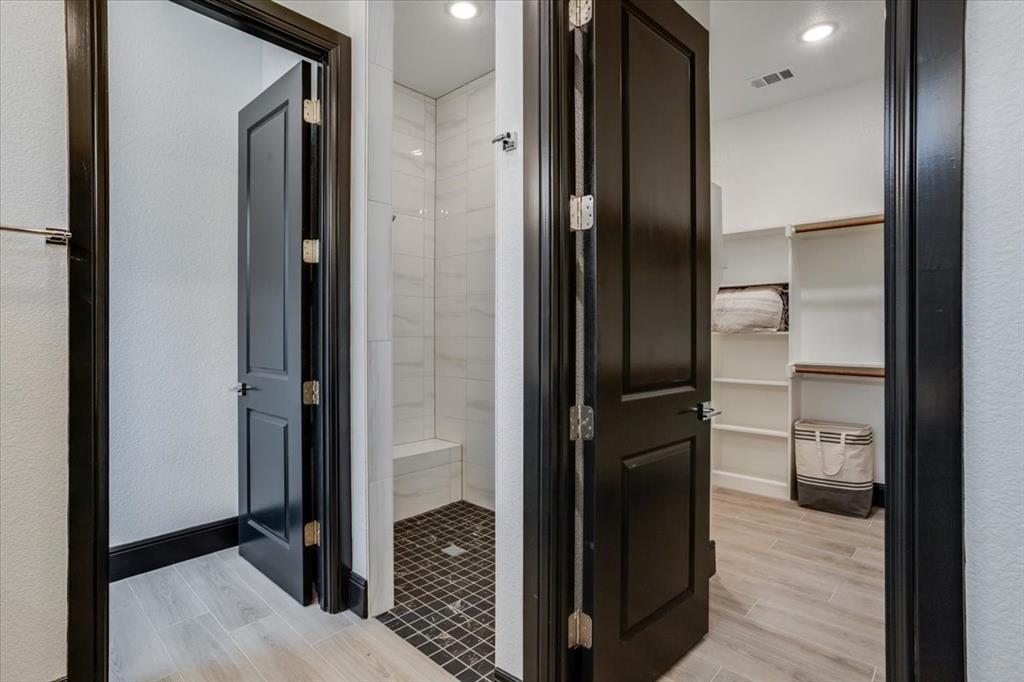 124 Cote D Azur Chico, TX 76431 - Photo 20 of 40 a bathroom with a glass door shower and a sink