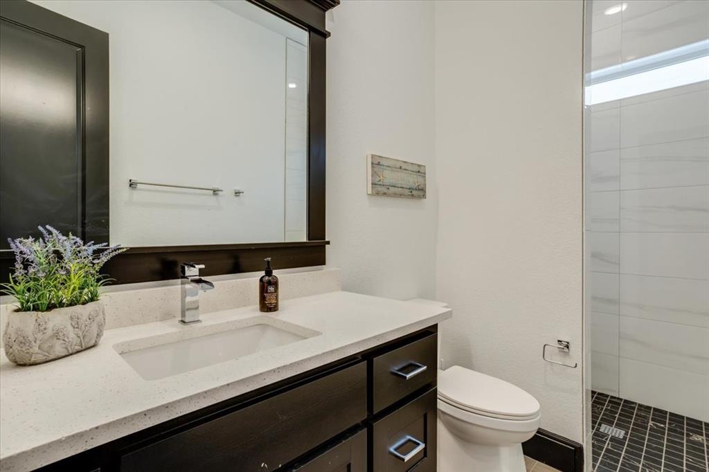 124 Cote D Azur Chico, TX 76431 - Photo 24 of 40 a bathroom with a sink and a mirror