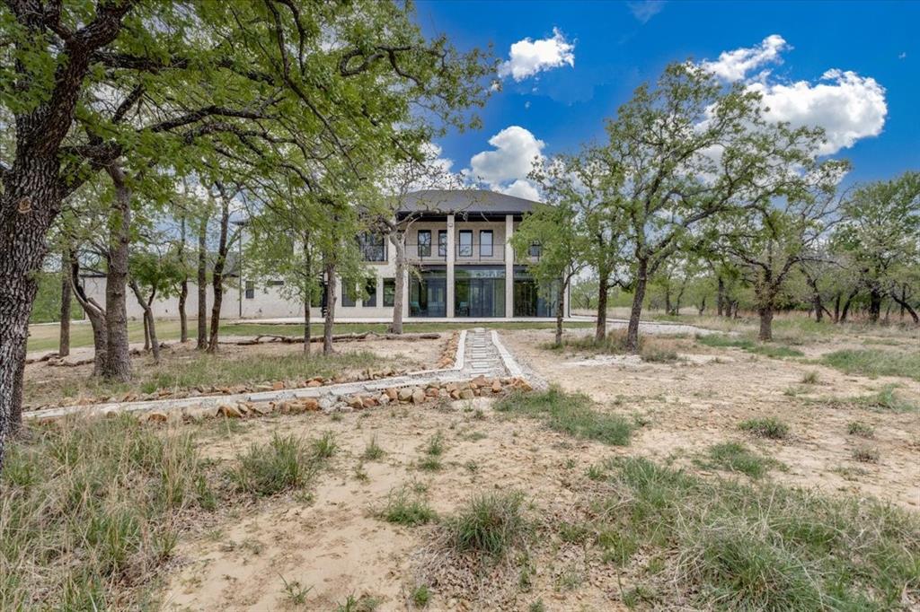 124 Cote D Azur Chico, TX 76431 - Photo 34 of 40 a front view of a house with a yard