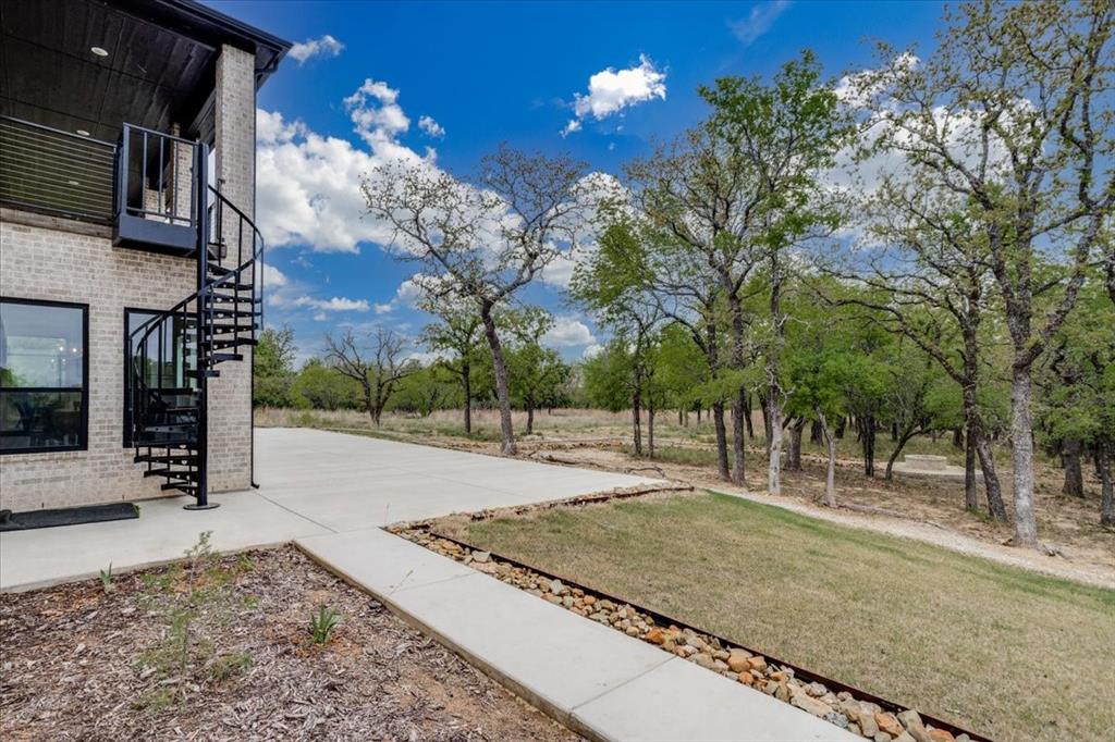 124 Cote D Azur Chico, TX 76431 - Photo 36 of 40 a view of a backyard of the house