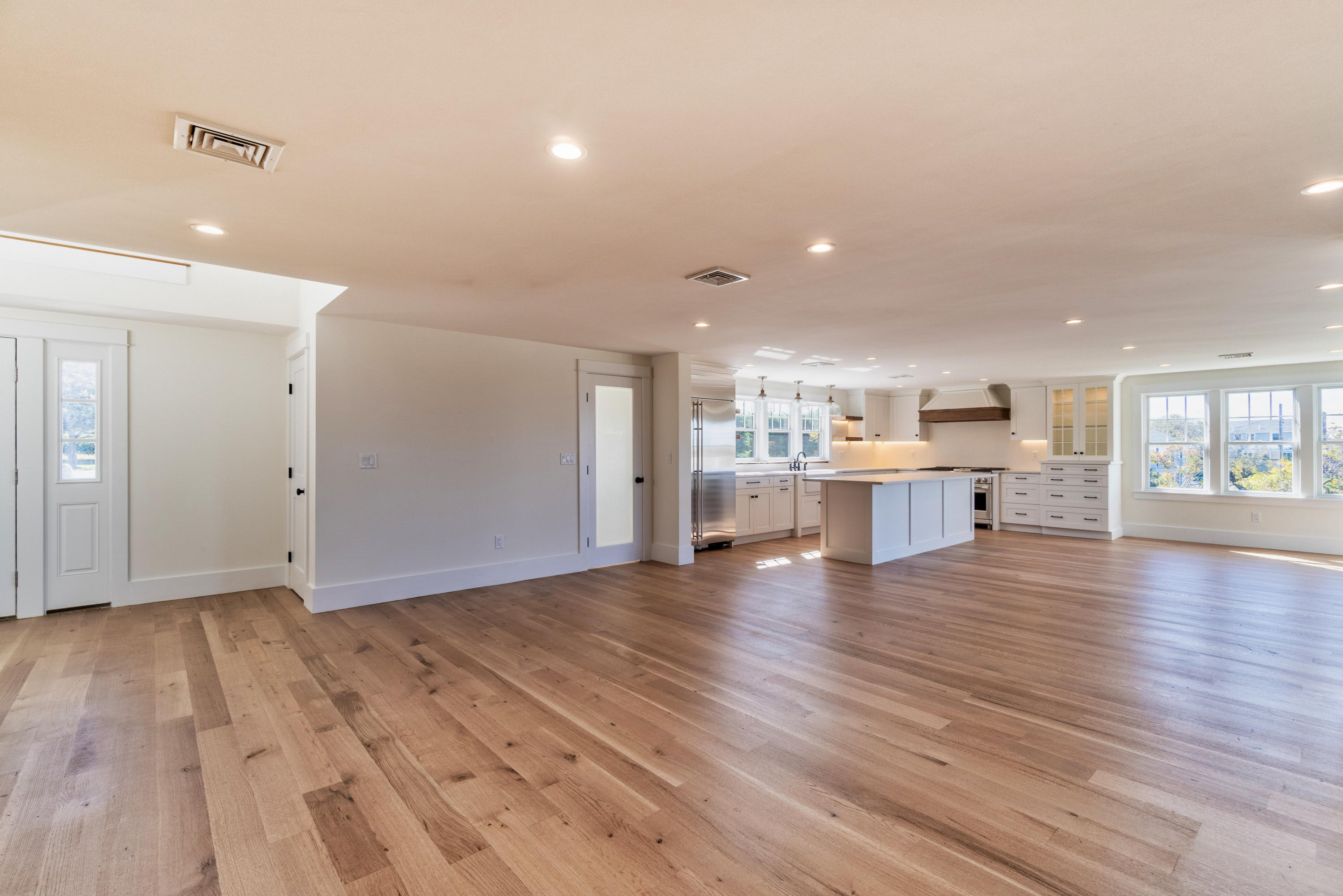 74 East Bay View Road Dennis, MA 02638 - Photo 8 of 76 Great room LR to kitchen and foyer