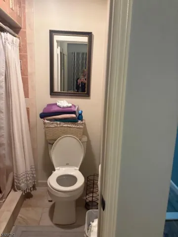 a bathroom with a toilet and a sink