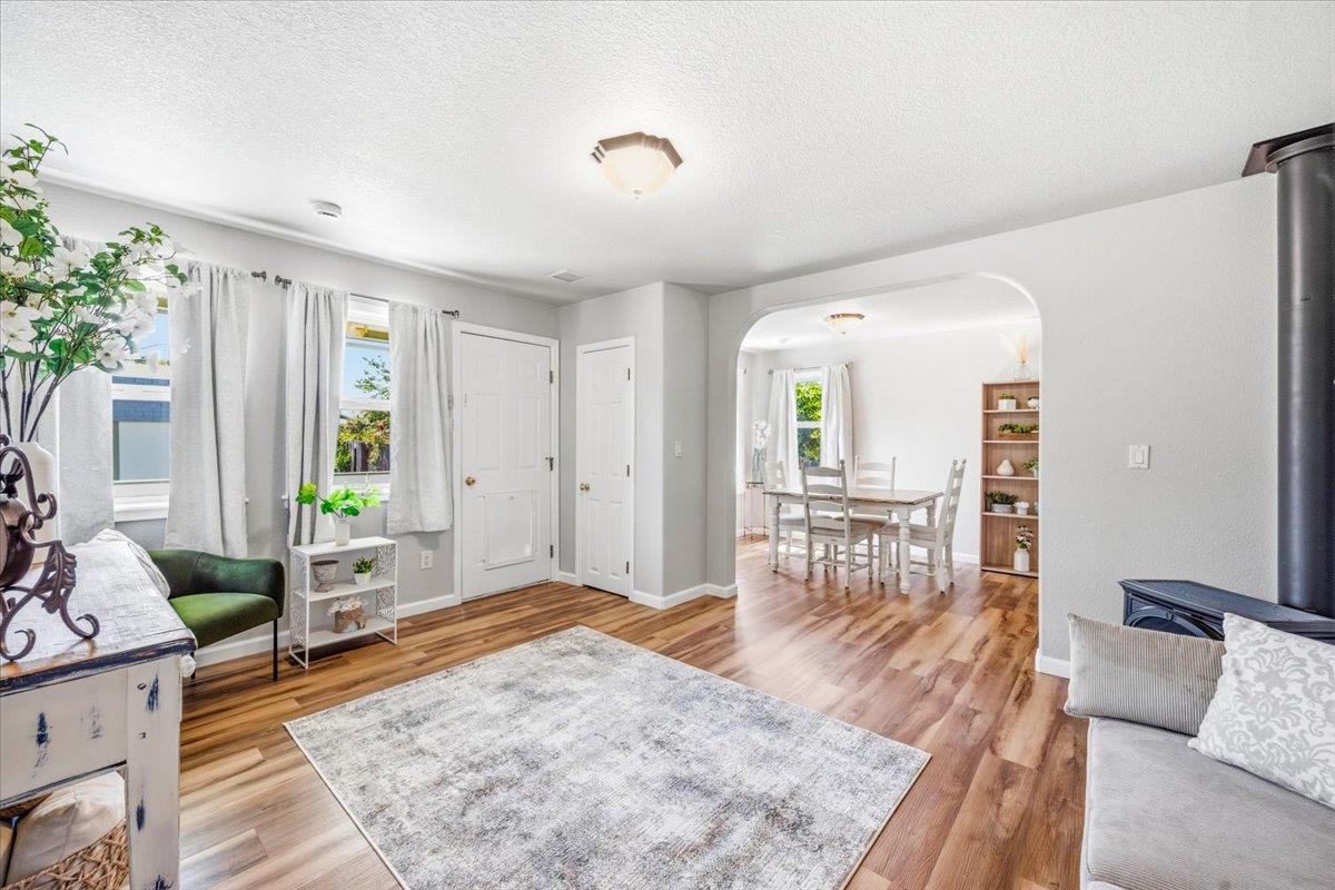 232 Upper Slate Creek Road Grass Valley, CA 95945 - Photo 6 of 48 a living room with furniture and a table