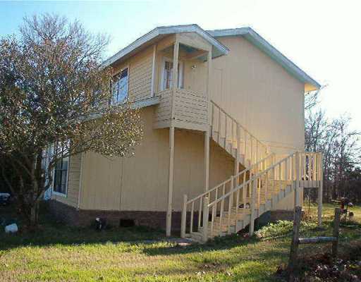 114 Thorne Road Cedar Creek, TX 78612 - Photo 1 of 1 a view of a house with a yard