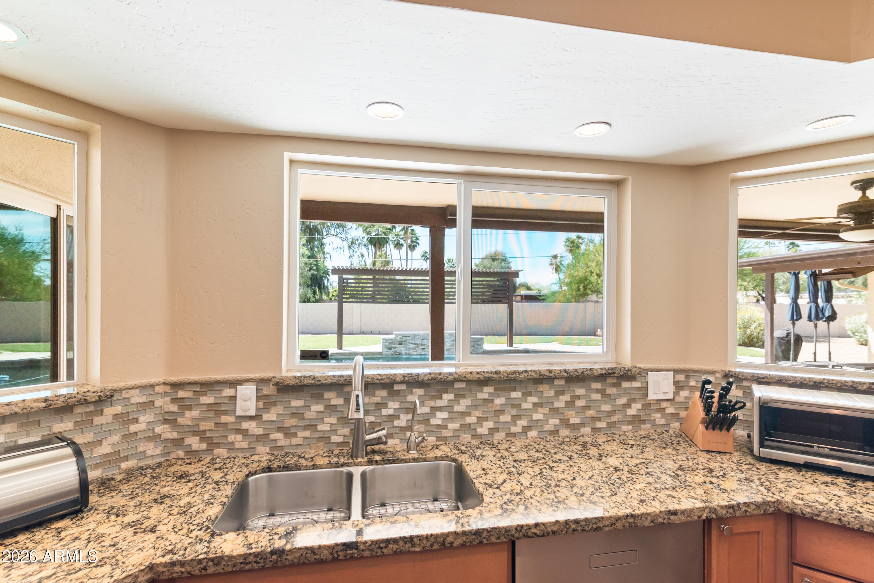5601 East Charter Oak Road Scottsdale, AZ 85254 - Photo 19 of 56 Kitchen Window Opening to Patio