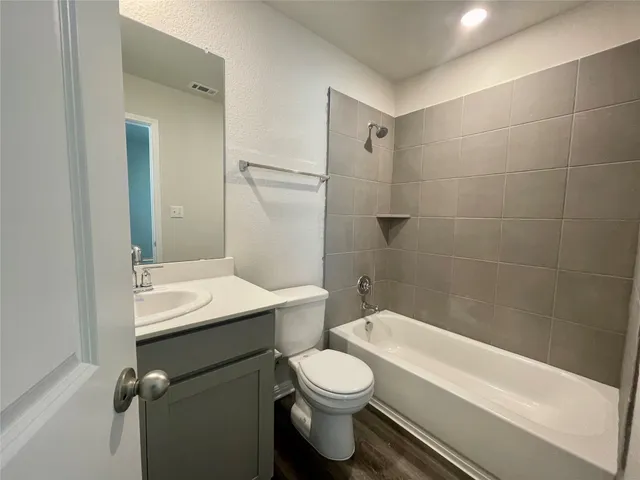 a view of small space with racks on the wall