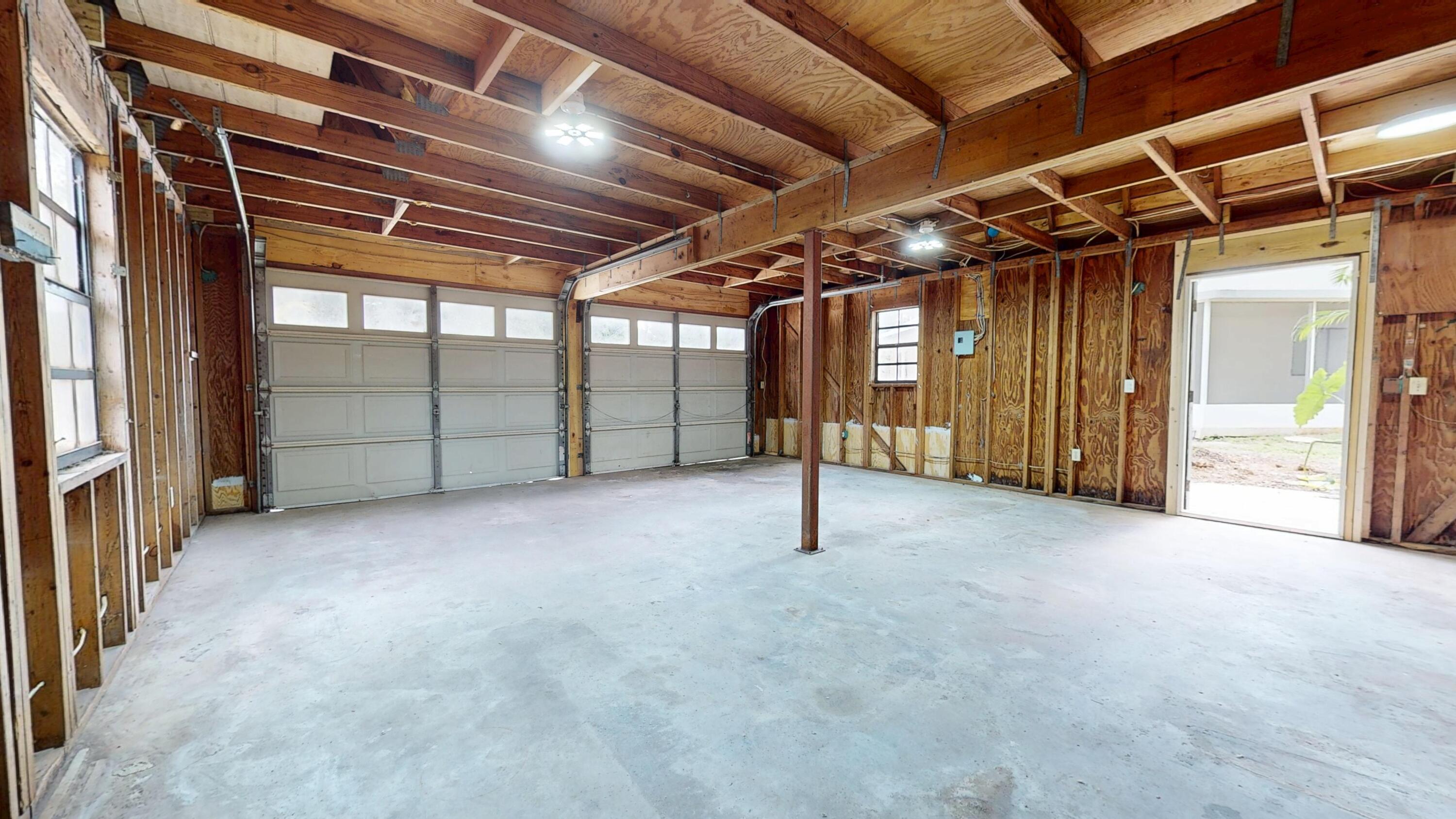 13018 153rd Road North Jupiter, FL 33478 - Photo 35 of 37 2 car garge area