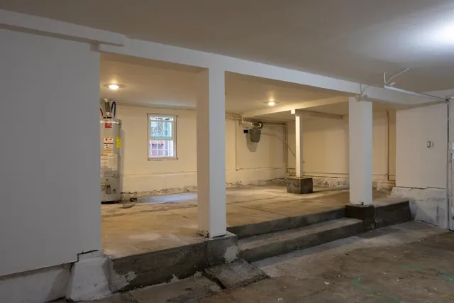 a view of a living room and bathroom