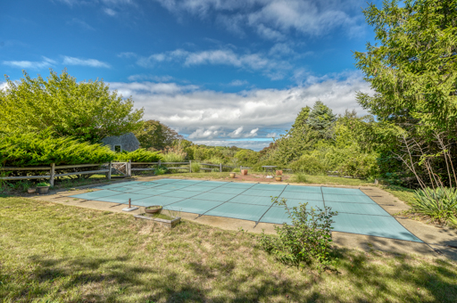 136 Naushon Road West Tisbury, MA 02568 - Photo 3 of 53 In ground pool with water view.