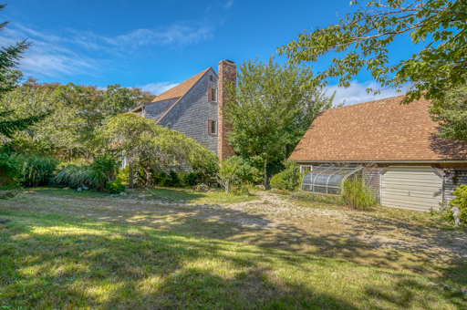 136 Naushon Road West Tisbury, MA 02568 - Photo 6 of 53 Main house and guest apt with garage, parking in front for multiple vehicles.