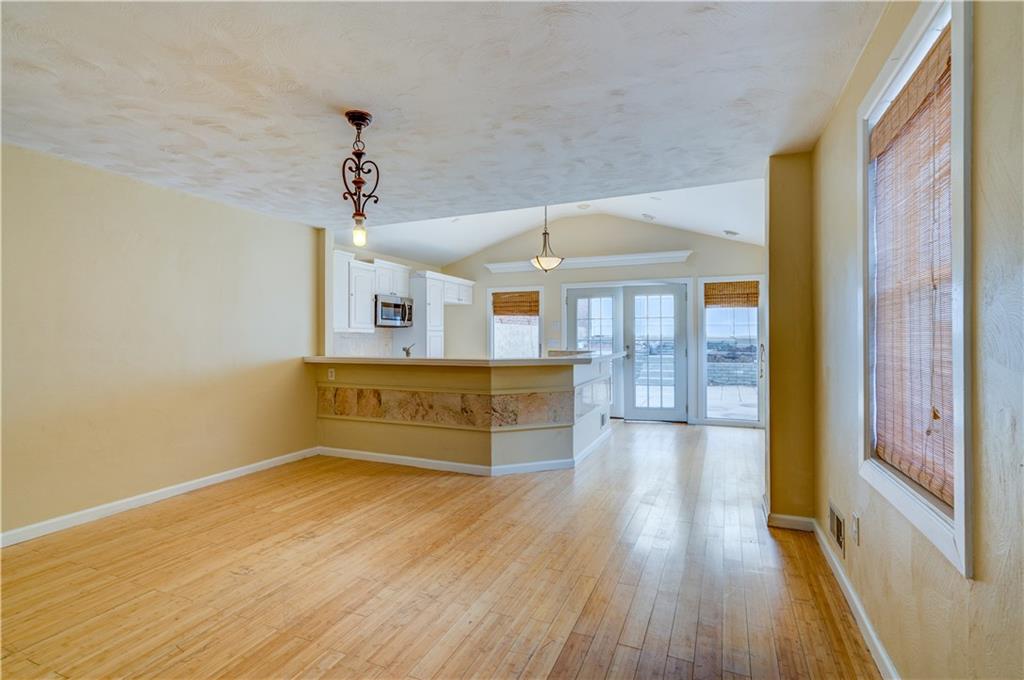5264 Dresden Way Pittsburgh, PA 15201 - Photo 5 of 16 wooden floor in an empty room with a window