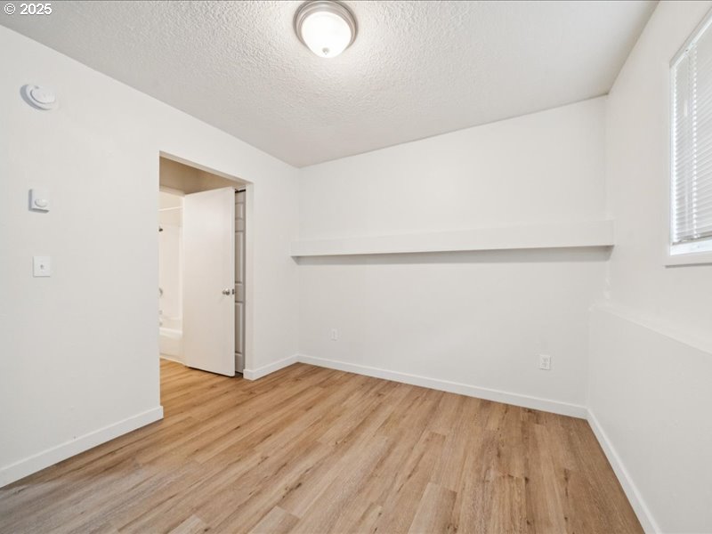 010 South Porter Street Portland, OR 97201 - Photo 6 of 11 a view of a room with wooden floor