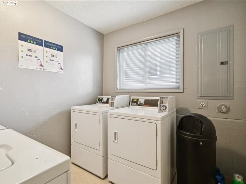 010 South Porter Street Portland, OR 97201 - Photo 7 of 11 a utility room with dryer and washer