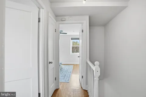 a view of a livingroom from a hallway