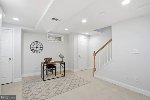 a view of a hallway with workspace