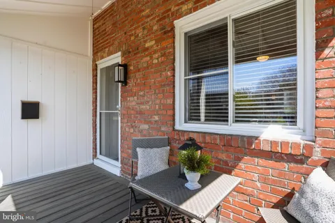 a view of backyard with a chair and couch