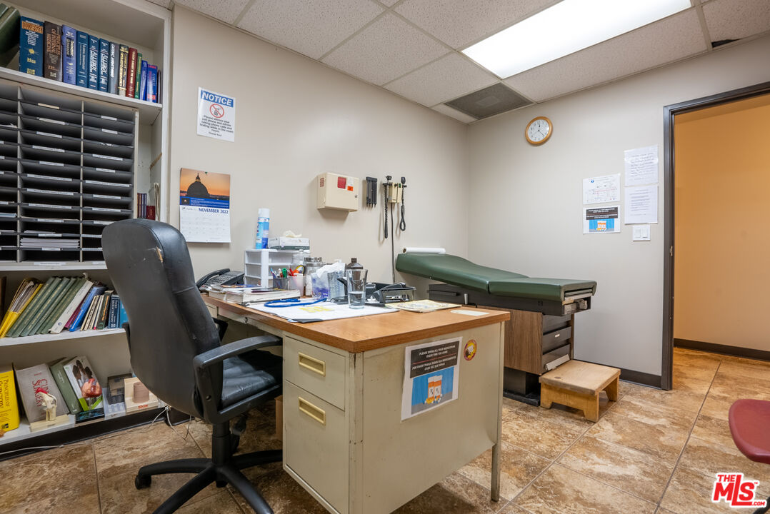 4946 Florence Avenue Bell, CA 90201 - Photo 15 of 72 a view of a workspace with furniture and toys
