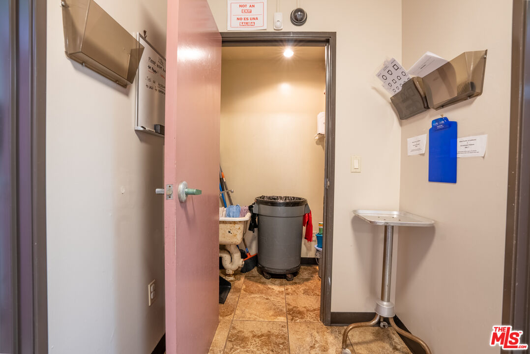 4946 Florence Avenue Bell, CA 90201 - Photo 21 of 72 a bathroom with a toilet and a shower