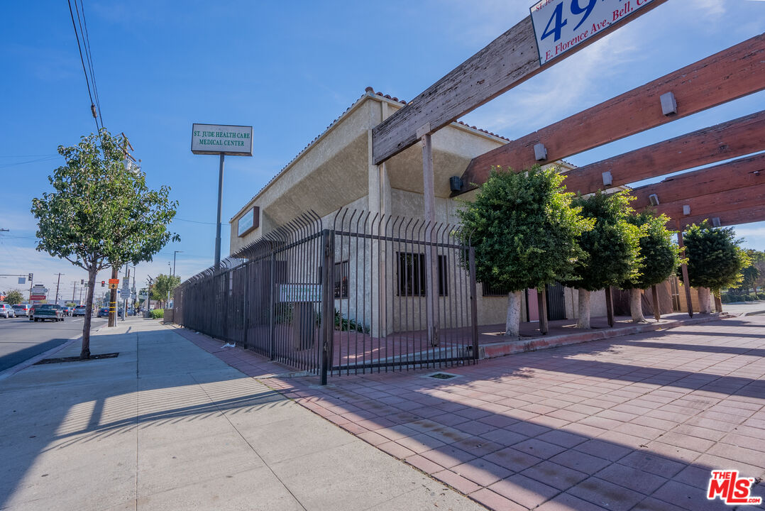 4946 Florence Avenue Bell, CA 90201 - Photo 26 of 72 a house with trees in front of it