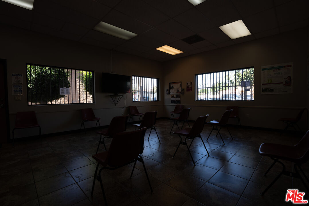 4946 Florence Avenue Bell, CA 90201 - Photo 34 of 72 a living room with furniture and a window