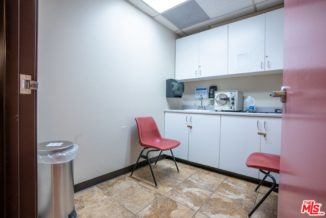 4946 Florence Avenue Bell, CA 90201 - Photo 49 of 72 a room with a chair and a sink