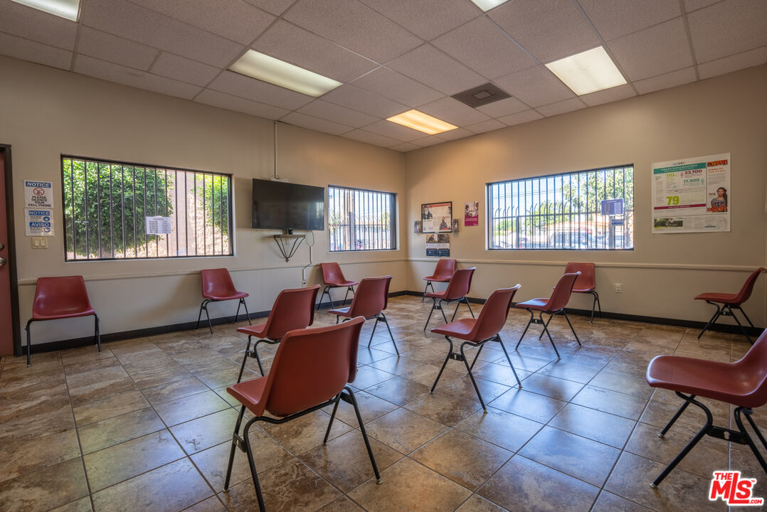 4946 Florence Avenue Bell, CA 90201 - Photo 64 of 72 a living room with furniture and a window