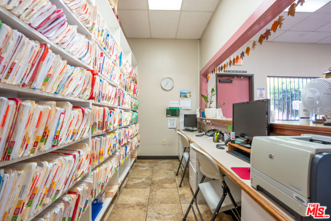4946 Florence Avenue Bell, CA 90201 - Photo 68 of 72 a room with furniture and musical instruments