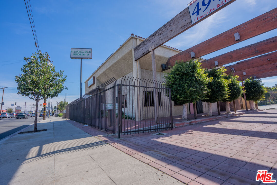 4946 Florence Avenue Bell, CA 90201 - Photo 69 of 72 a house with trees in front of it