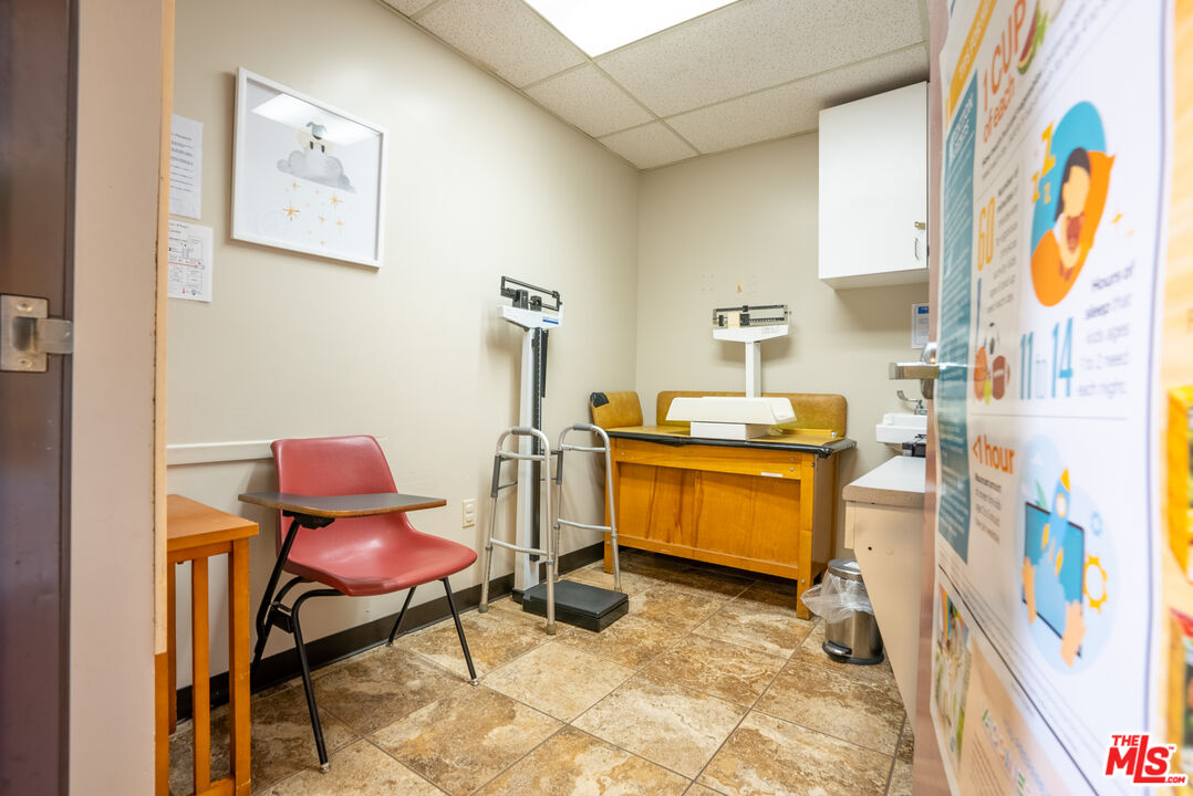 4946 Florence Avenue Bell, CA 90201 - Photo 7 of 72 a room with furniture and musical instruments