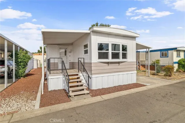 a view of a house with a patio