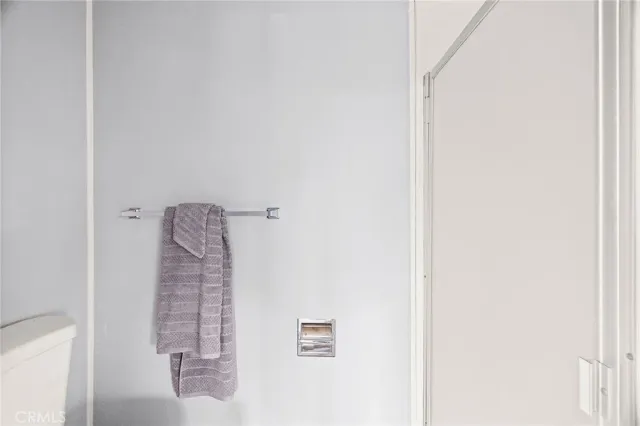 a view of backyard with small cabin